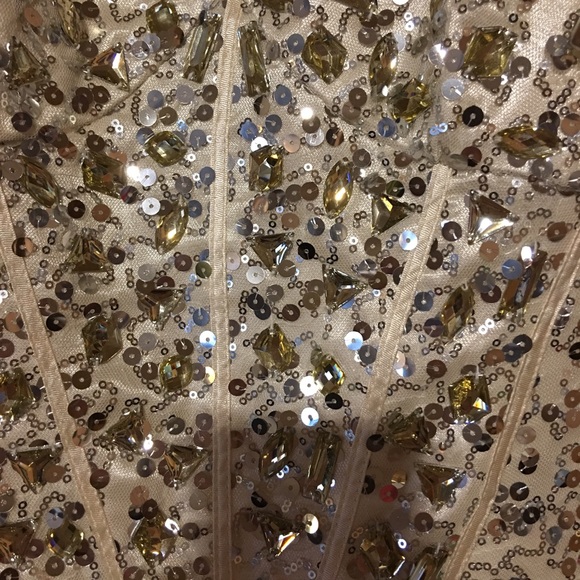 This is an exquisite gown. It’s ready for dancing. - Picture 2 of 8